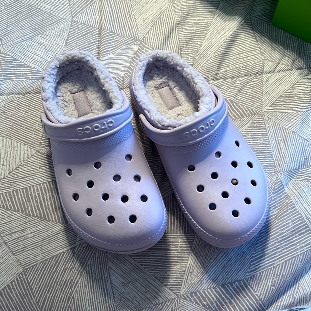 New Lilac colored fuzzy crocs. No tags, but never been worn.